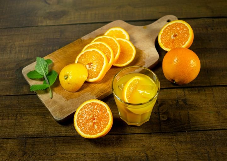 Oranges and mint for a spiced citrus bliss mocktail.