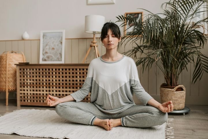 A woman practicing Sahaj Samadhi Meditation.