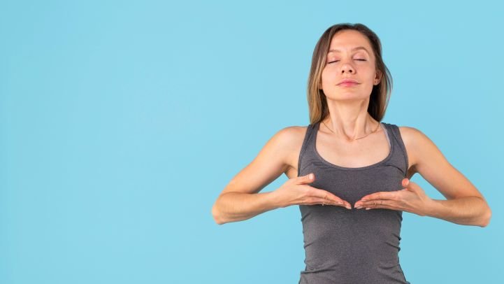Woman practicing deep breathing to increase her patience.