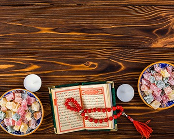 Prayer beads and open book