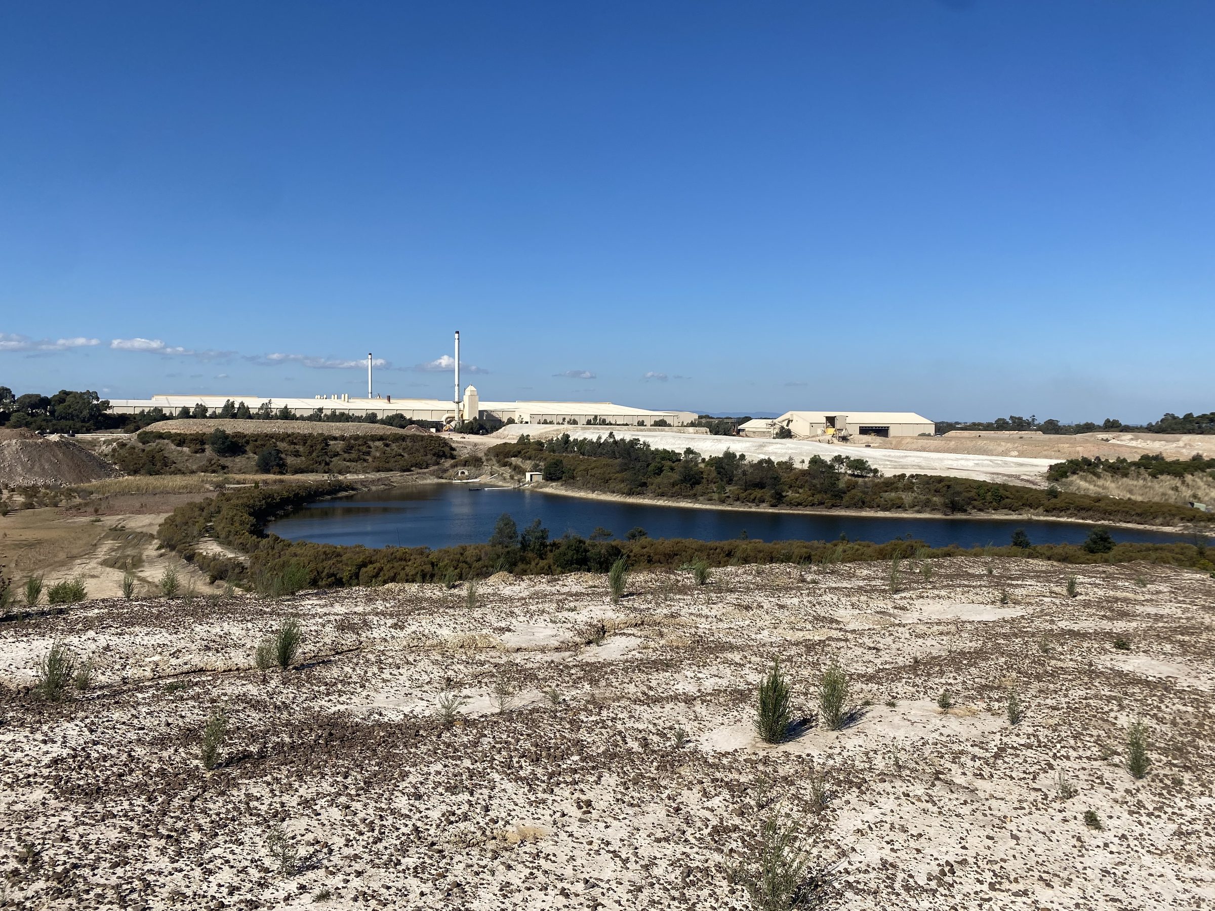 Quarry pit and water body at a brick making operation