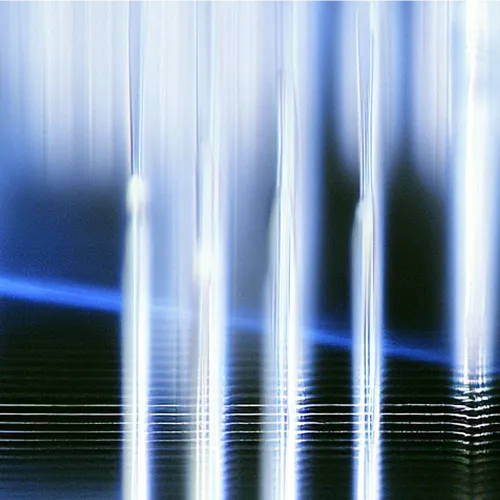 Abstract digital artwork with blue and white vertical light streaks on a dark background.