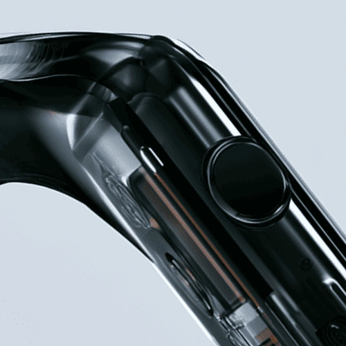 Close-up of a sleek black smartwatch with a round button and transparent casing.