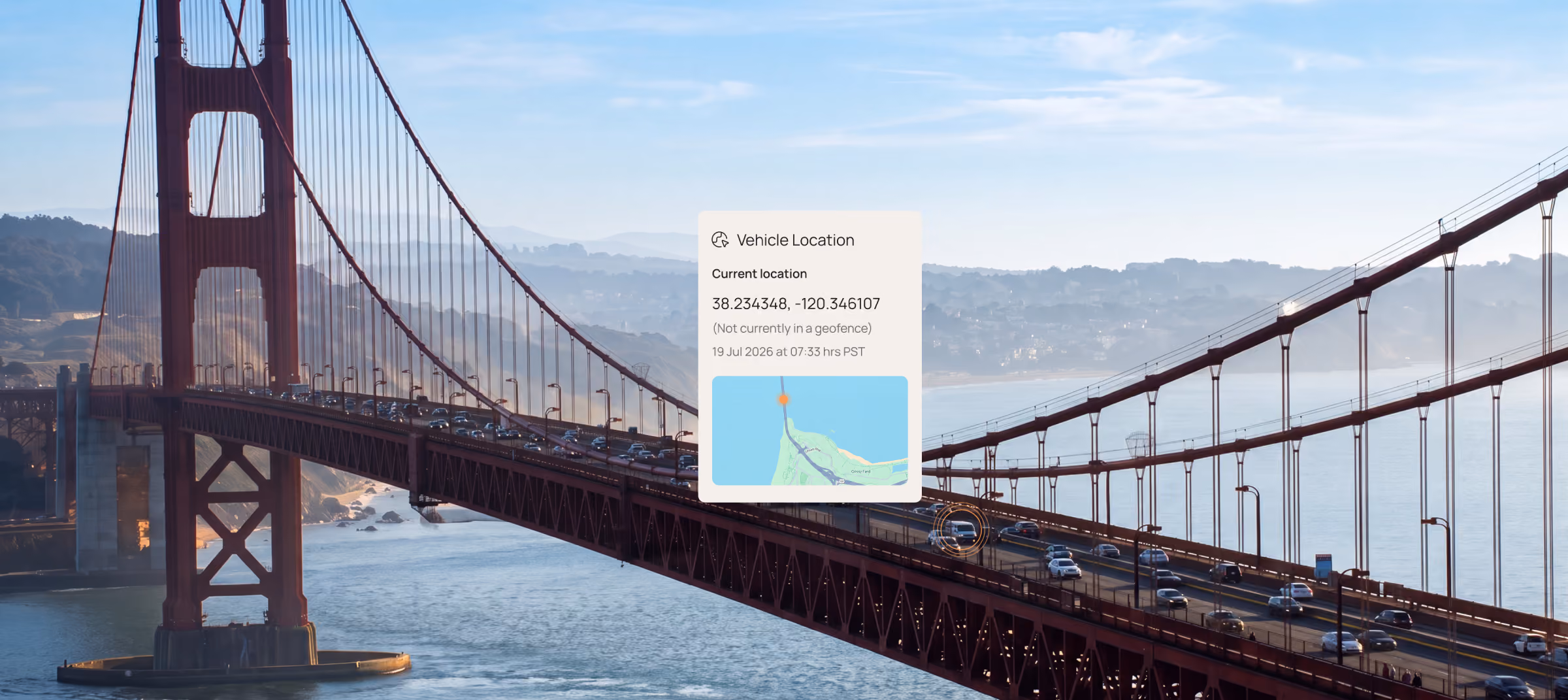 Golden Gate Bridge with a Motorq dashboard overlay showing GPS vehicle location