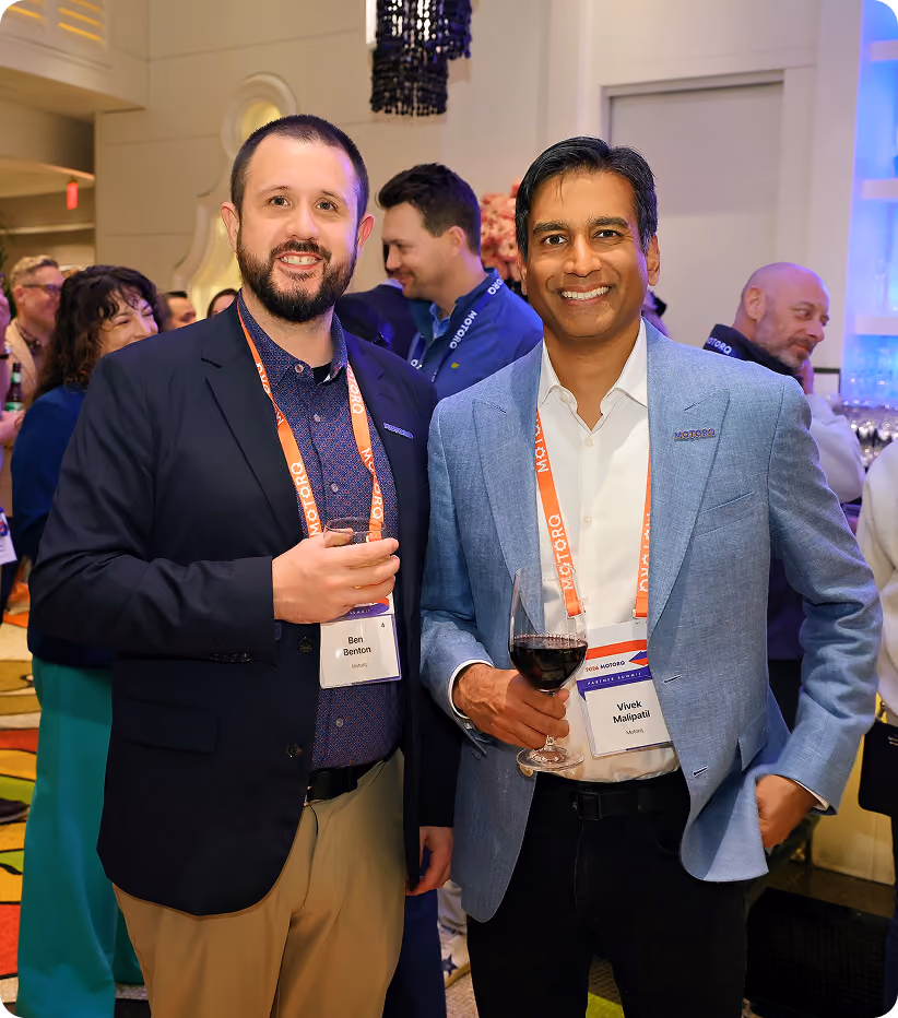 Colleagues posing together at a company conference