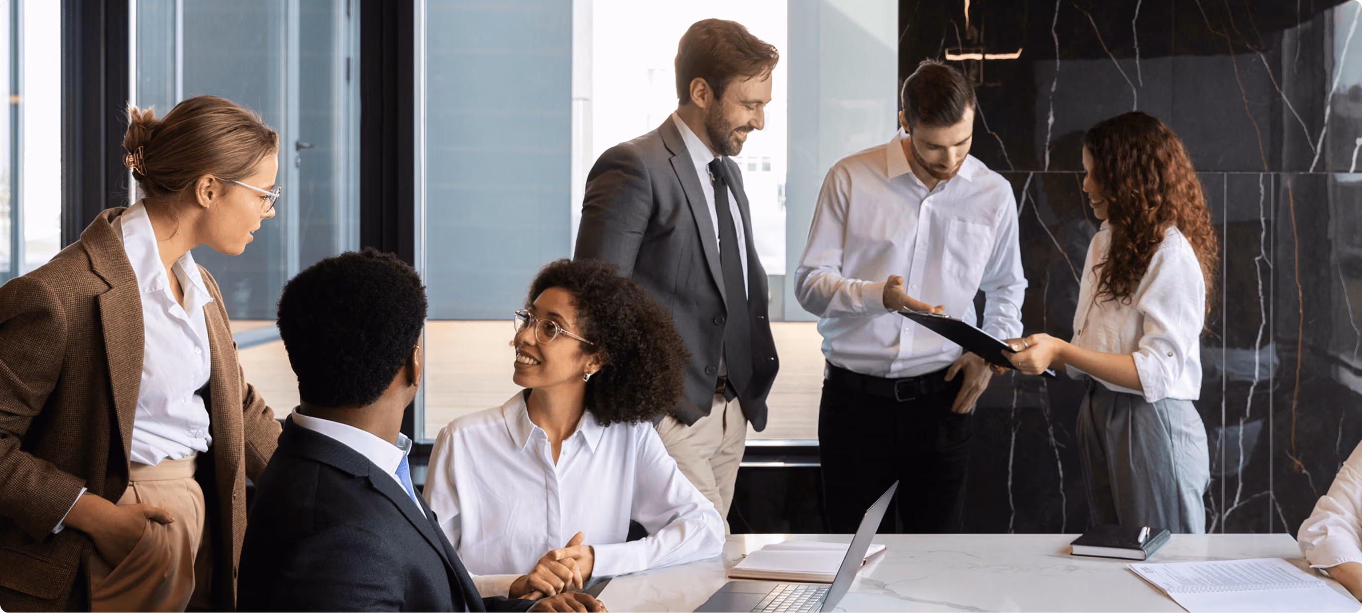 Team of colleagues discussing in a meeting room
