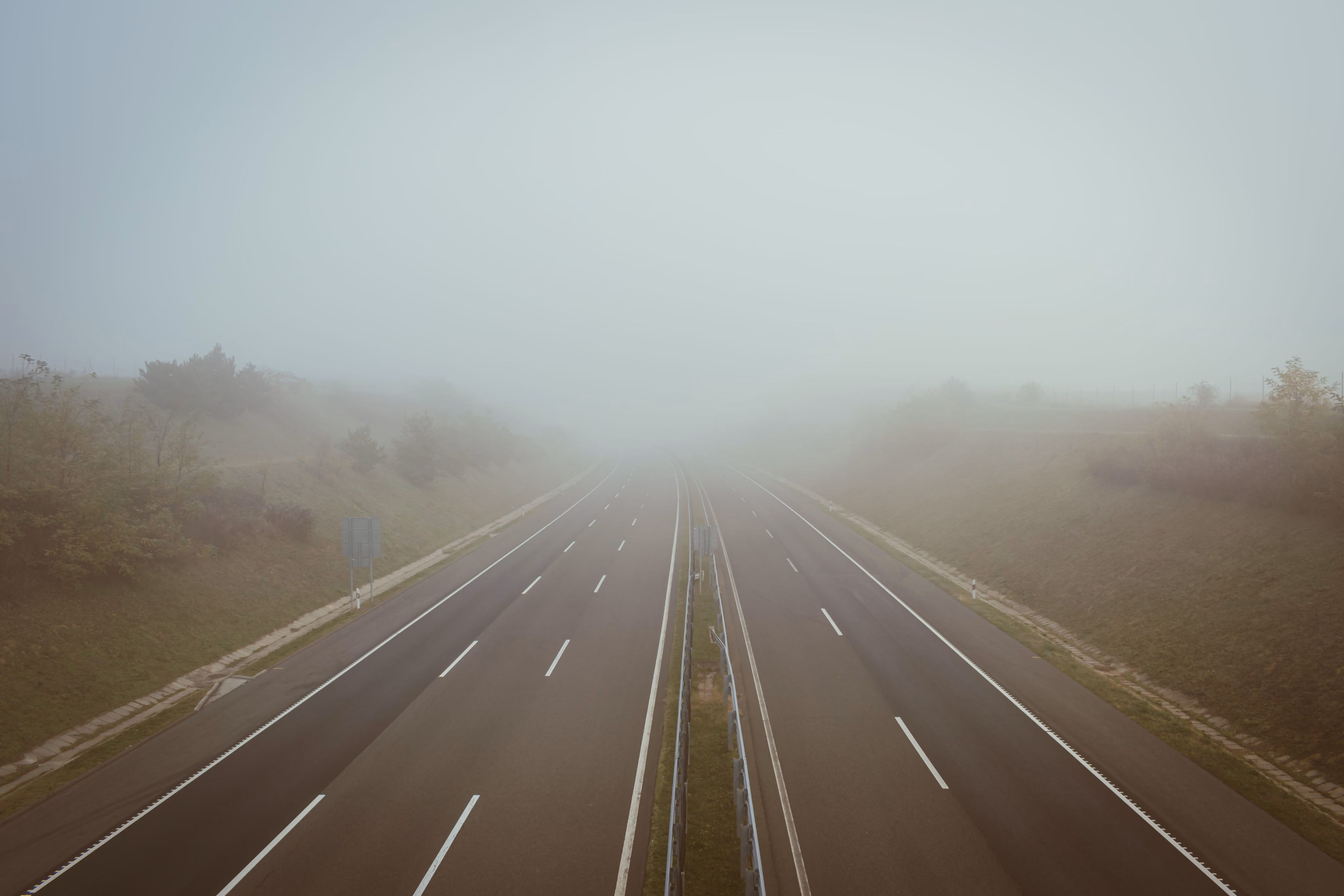 Foggy highway stretching into the distance