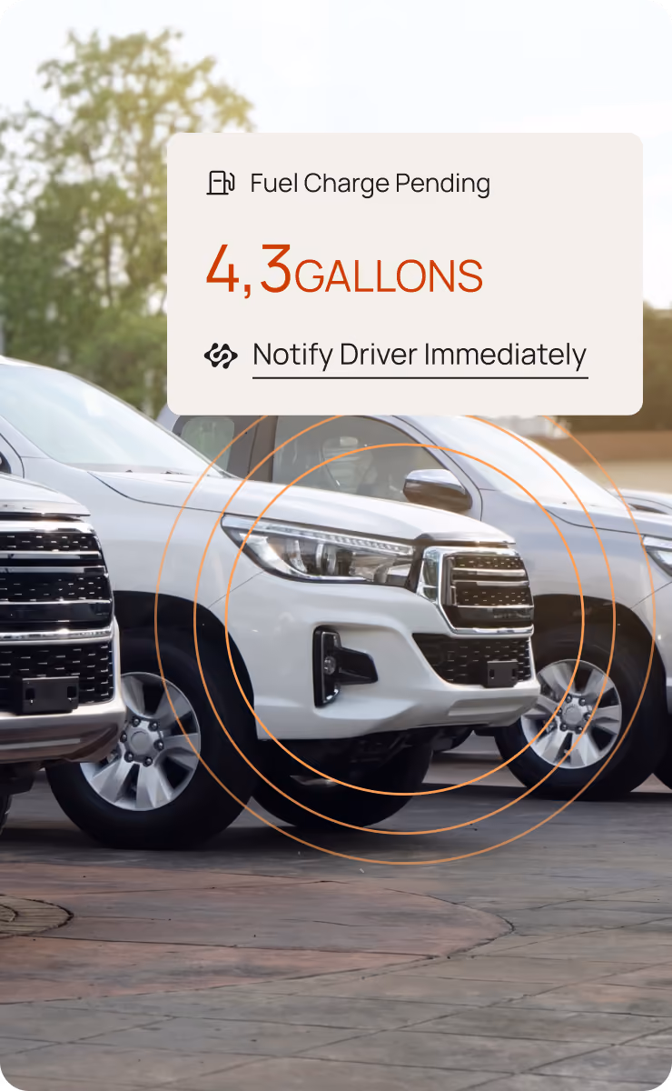 Pickup trucks with a Motorq dashboard overlay showing a fuel charge pending alert
