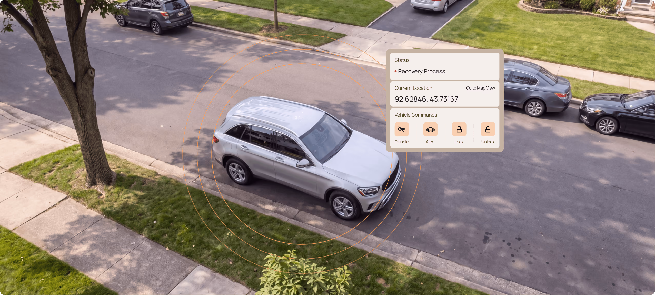 Aerial view of a residential street with a car and a Motorq dashboard info panel