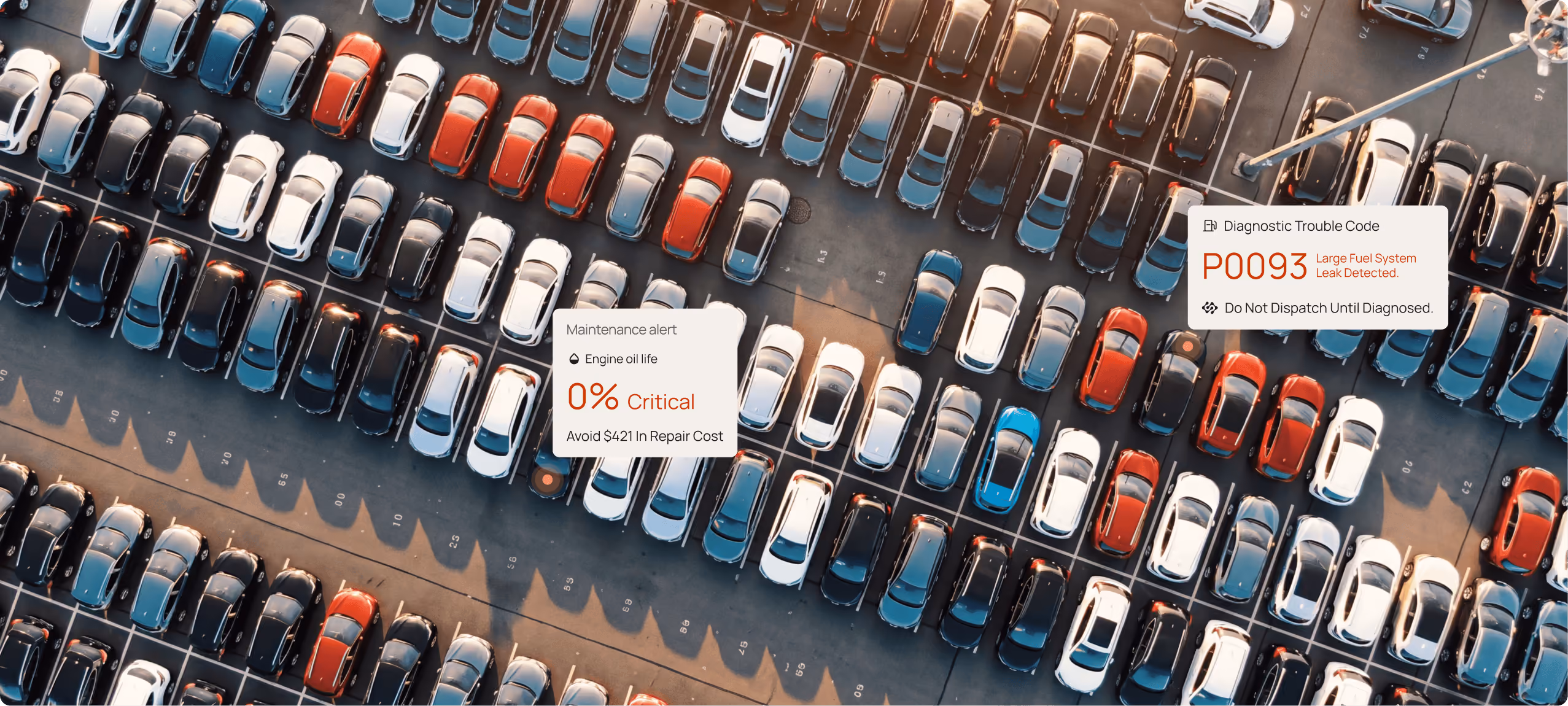 Aerial view of a parking lot with a Motorq maintenance dashboard overlay
