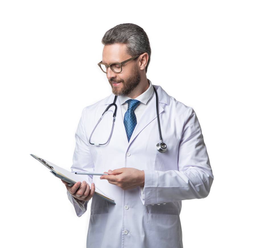 Male doctor in a white lab coat with a stethoscope reviewing a patient's chart on a clipboard.