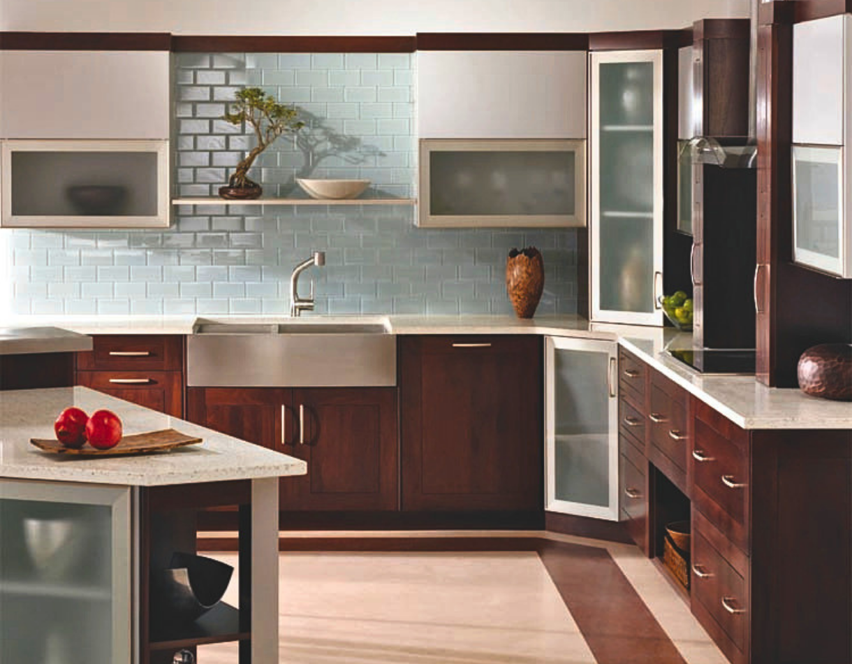 A transitional kitchen featuring AF002 aluminum frame cabinet doors in a brushed stainless finish with satin glass inserts.