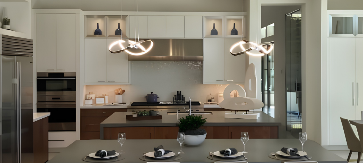 A transitional kitchen featuring AF003 aluminum frame cabinet doors in a brushed stainless finish with satin glass inserts.