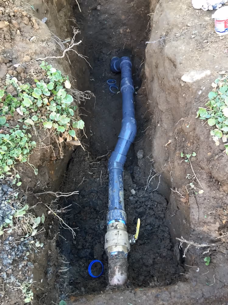Newly installed underground water line in trench repair project in Los Angeles, CA.