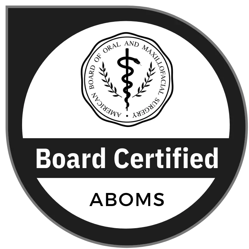 Seal for the American Board of Oral and Maxillofacial Surgery with text Board Certified ABOMS.