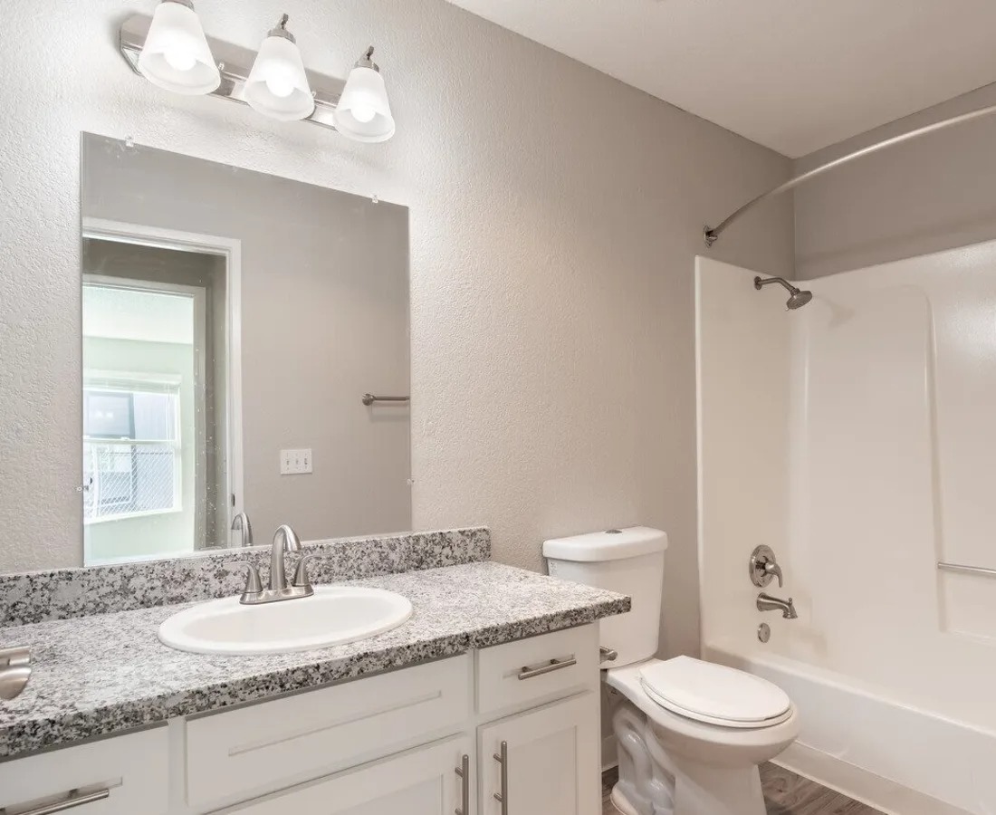 Bathroom with white cabinets