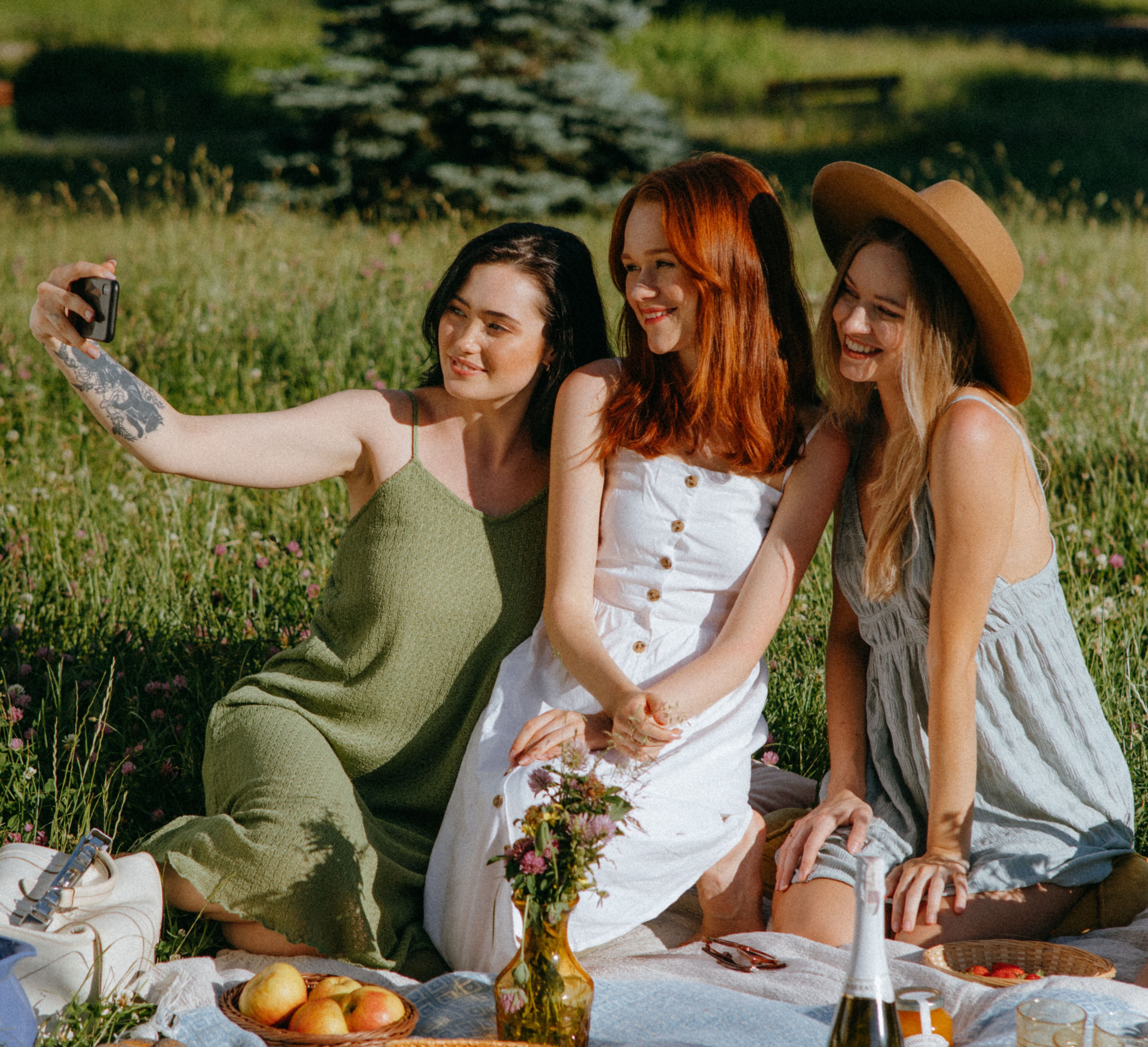 Women taking photo sitting down stock image Sierra at Sunset Village