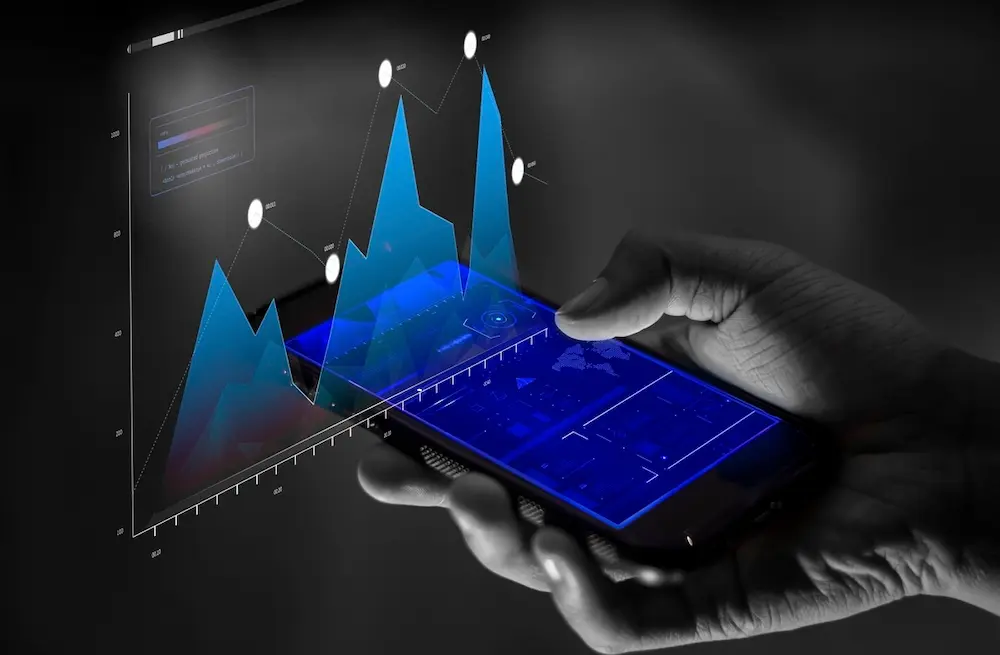 Image depicting digital transformation showing graphs on a mobile phone.