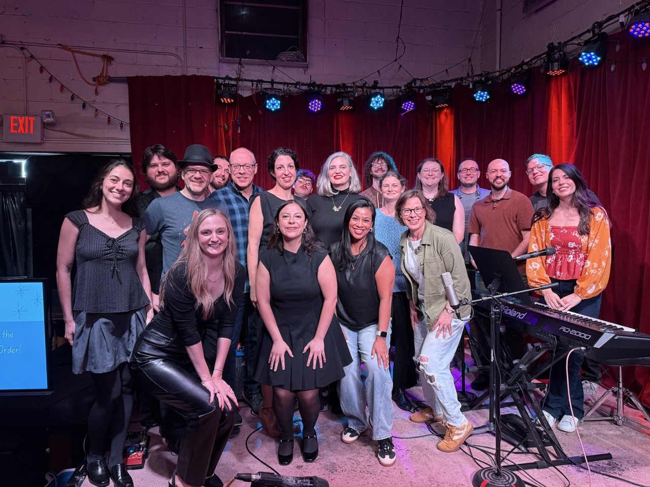 Kaitlyn with adult students after their recital and social