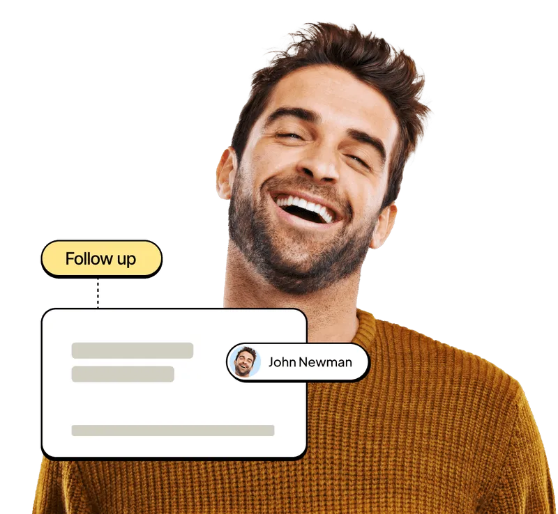 A man smiling with a message bubble above his head.