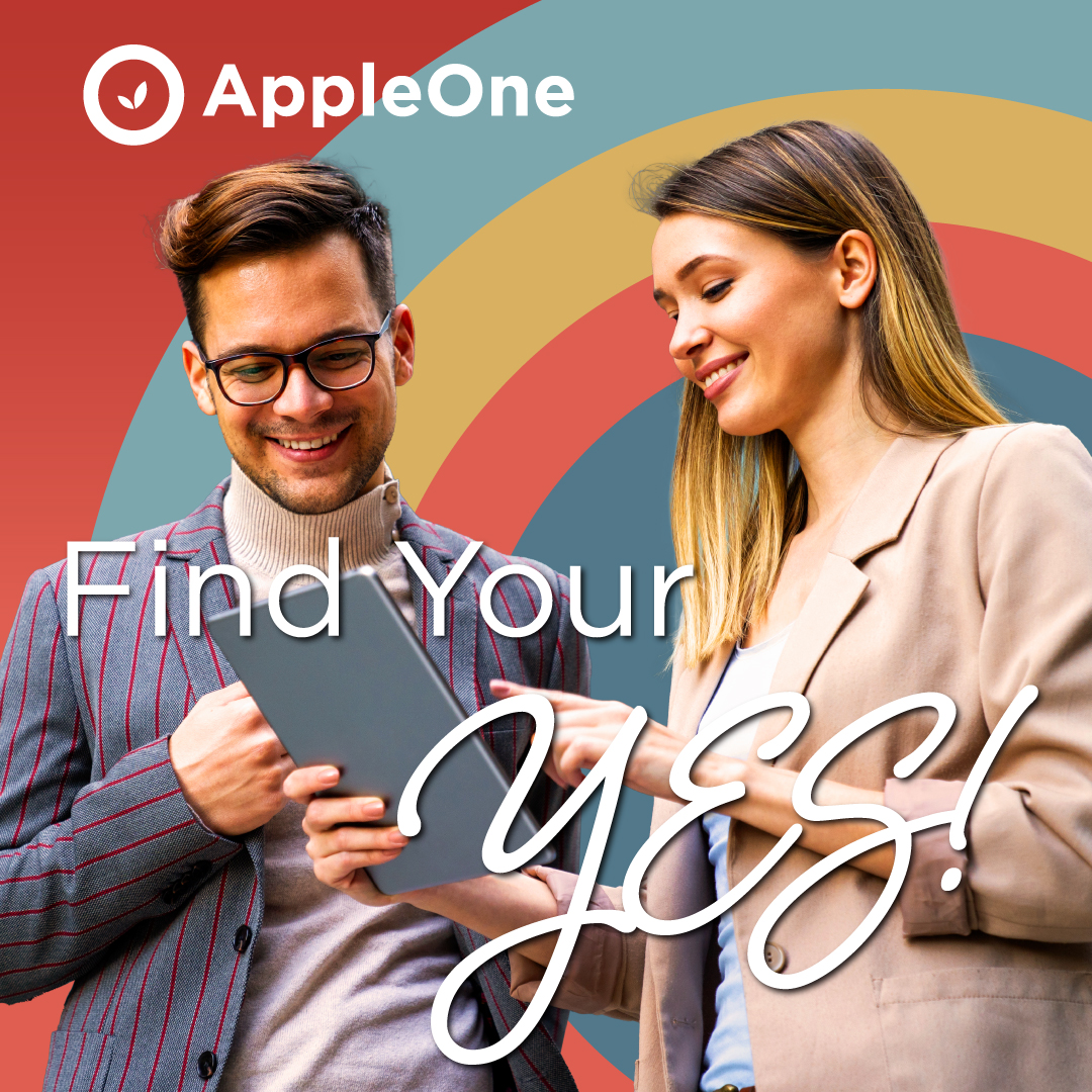 Two professionals looking over a tablet. The text says "Find Your Yes!"