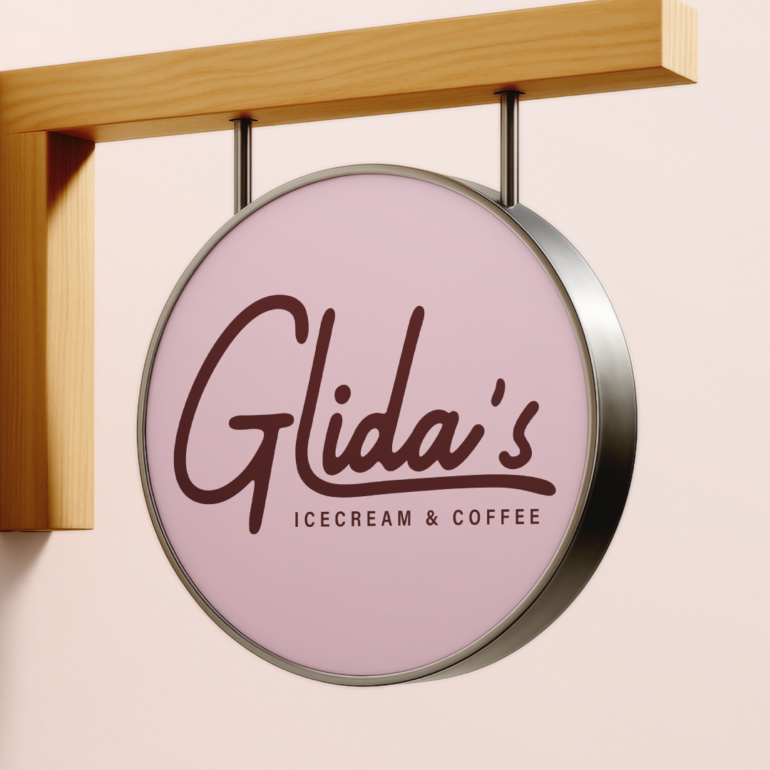 Mock up of a sign with the Glida's logo on it.