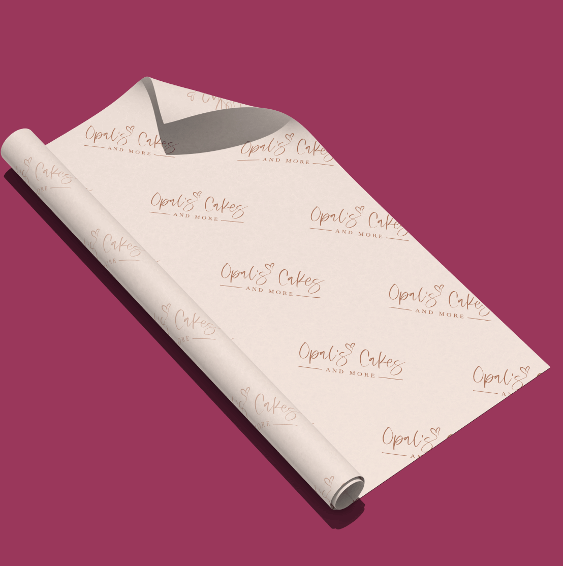 Beige wrapping paper with a step and repeat pattern of the Opal's Cakes and More logo.