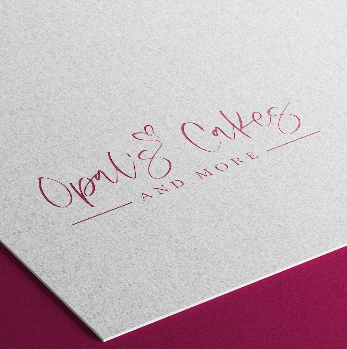 The Opal's Cakes and More logo printed on paper.