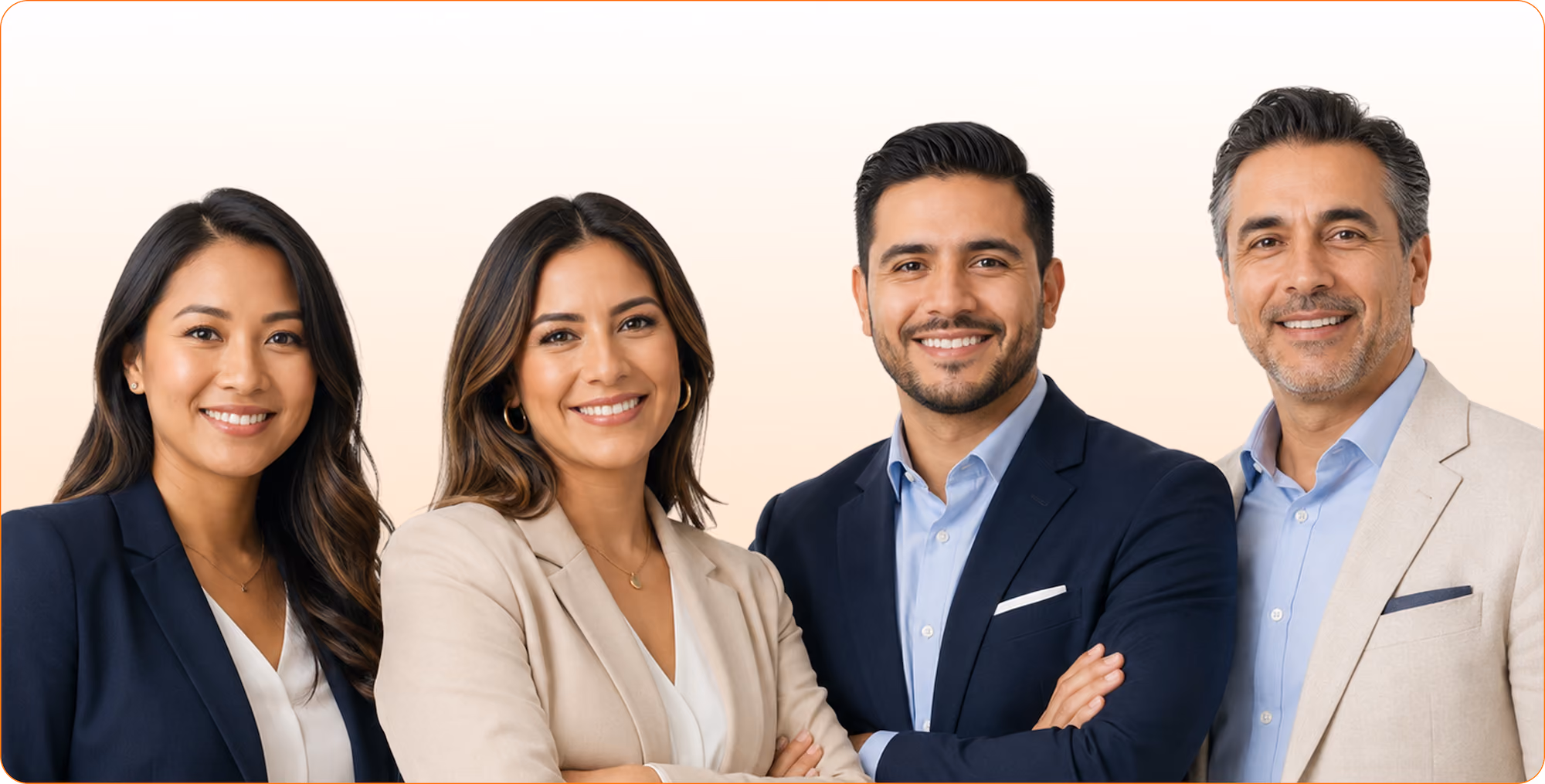 Group of two women and two men in business attire smiling with arms crossed on light background.