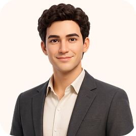 Portrait of a young man with dark curly hair wearing a dark blazer over a light-colored button-up shirt, smiling softly against a light background.