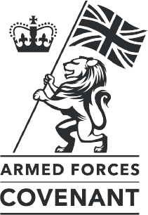 Stylized lion holding a Union Jack flag above text Armed Forces Covenant and a royal crown.
