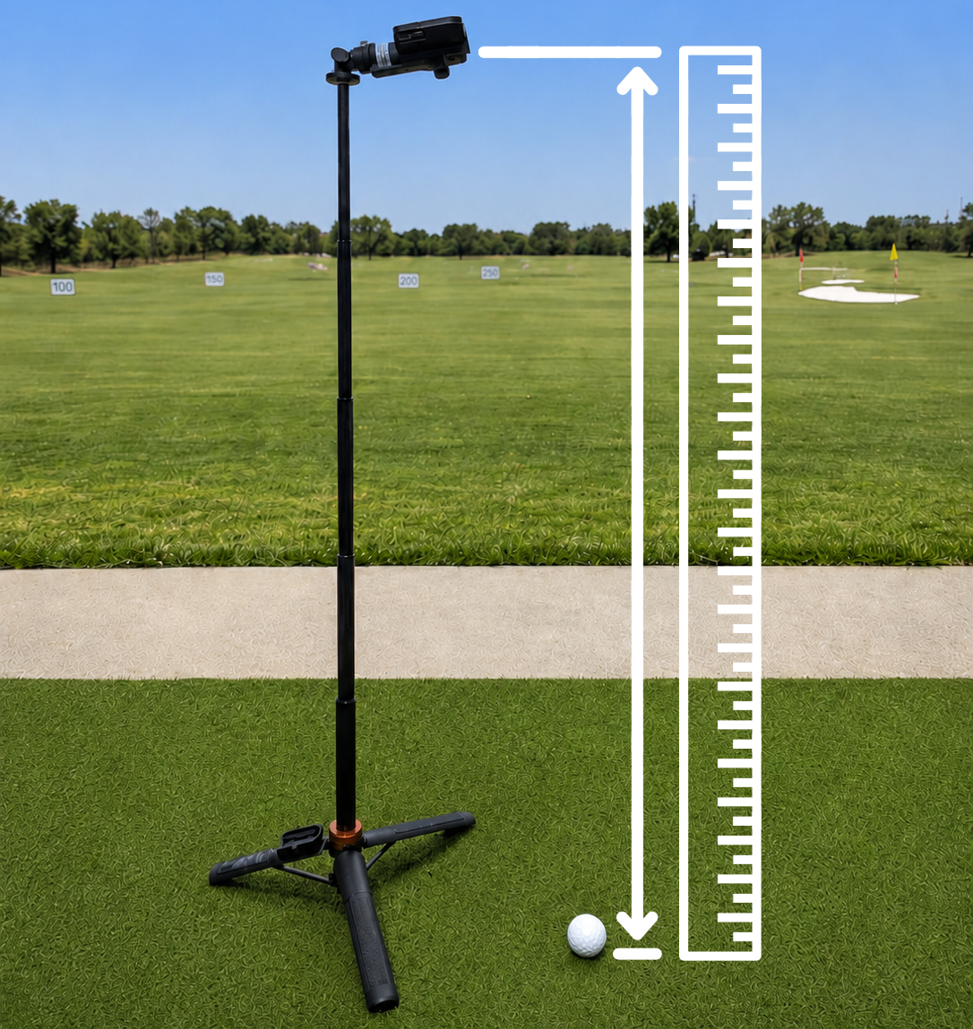 Phone mounted on a tripod beside a golf ball with the camera height marked vertically