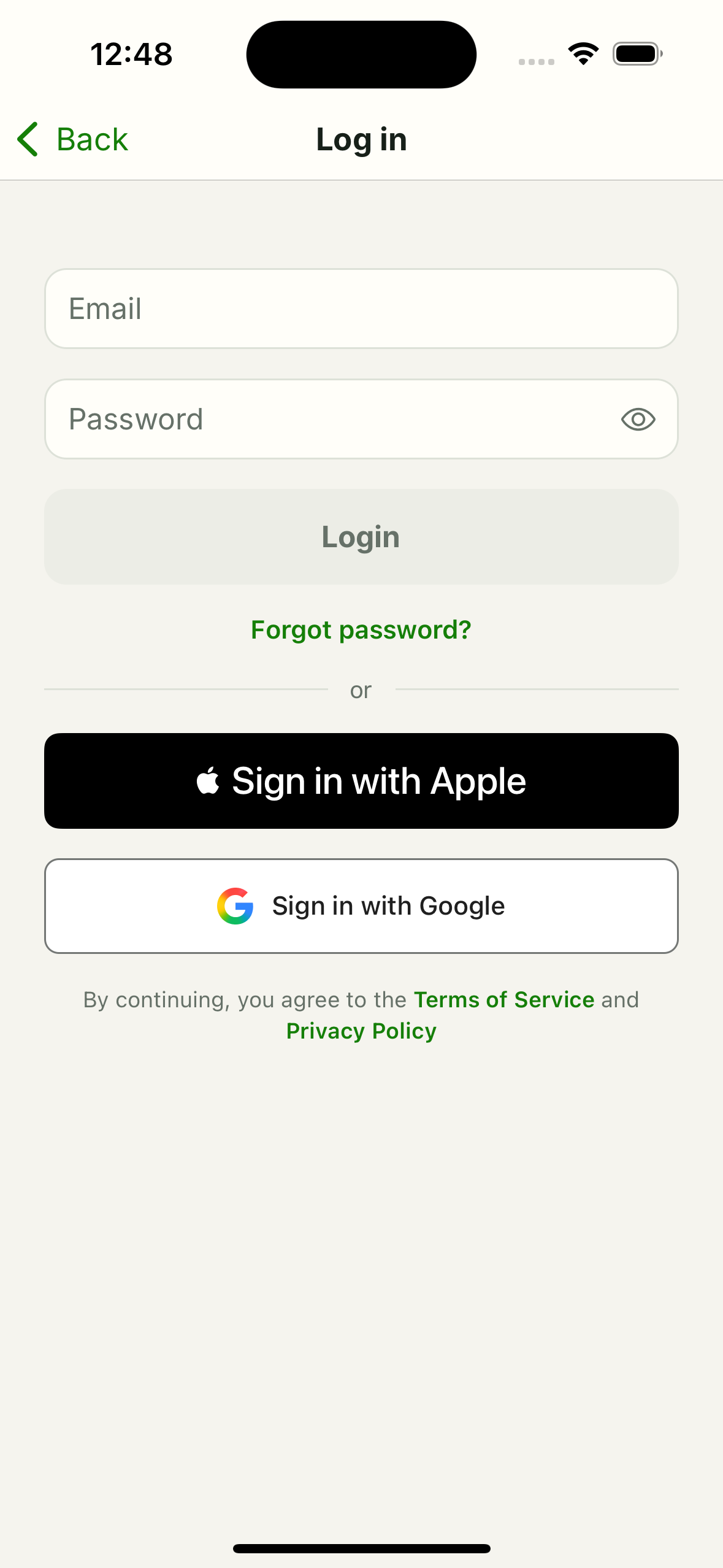 Trackeon log in screen with email, password fields and Apple/Google buttons