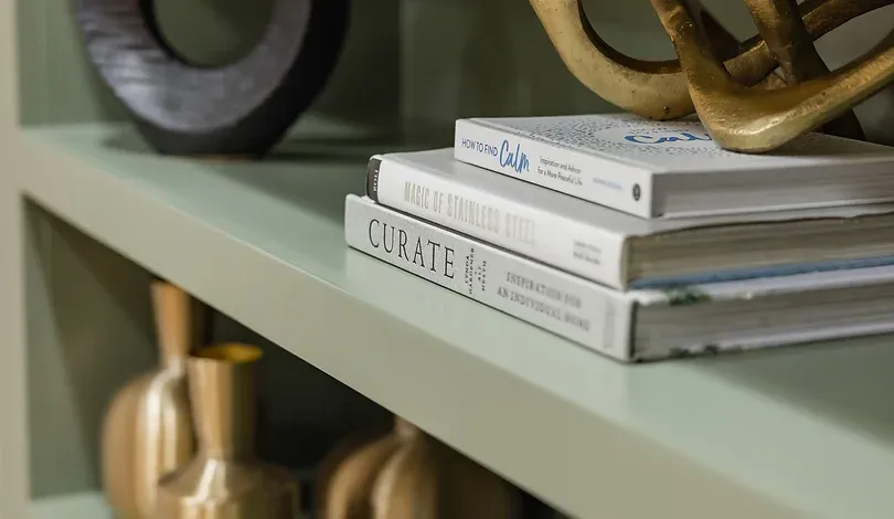 Books and decor on a shelf in the Ridgefield Orthodontics office