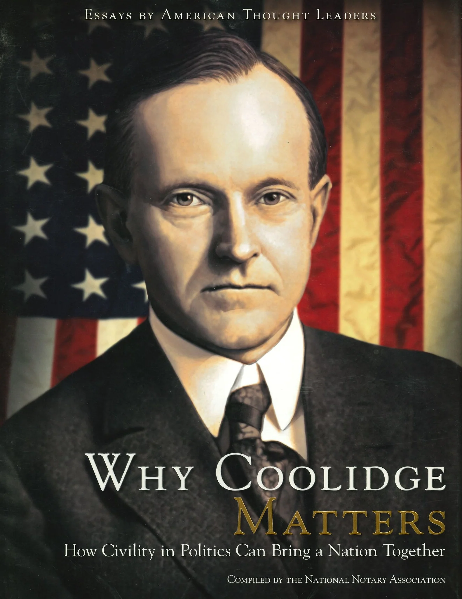 Portrait of a man in a suit against the American flag backdrop