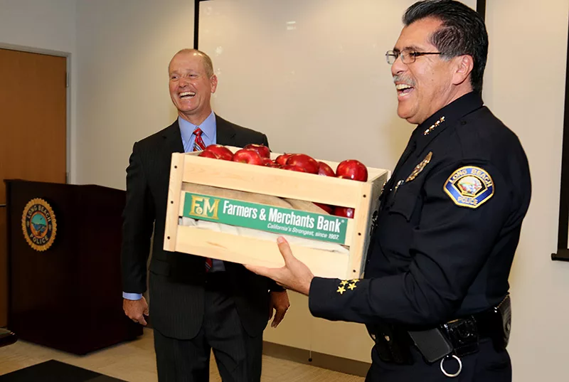 Man in police uniform smiling