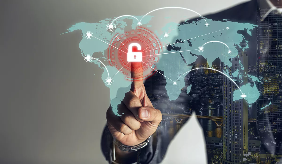 Businessman pointing at digital padlock on world map