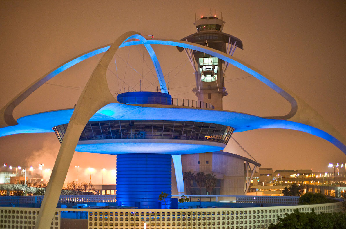 Futuristic restaurant glowing with blue lights at night