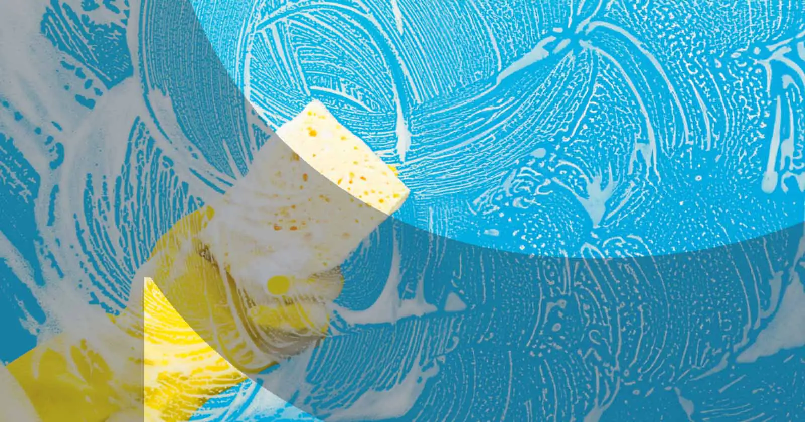 Yellow sponge cleaning soapy blue glass surface