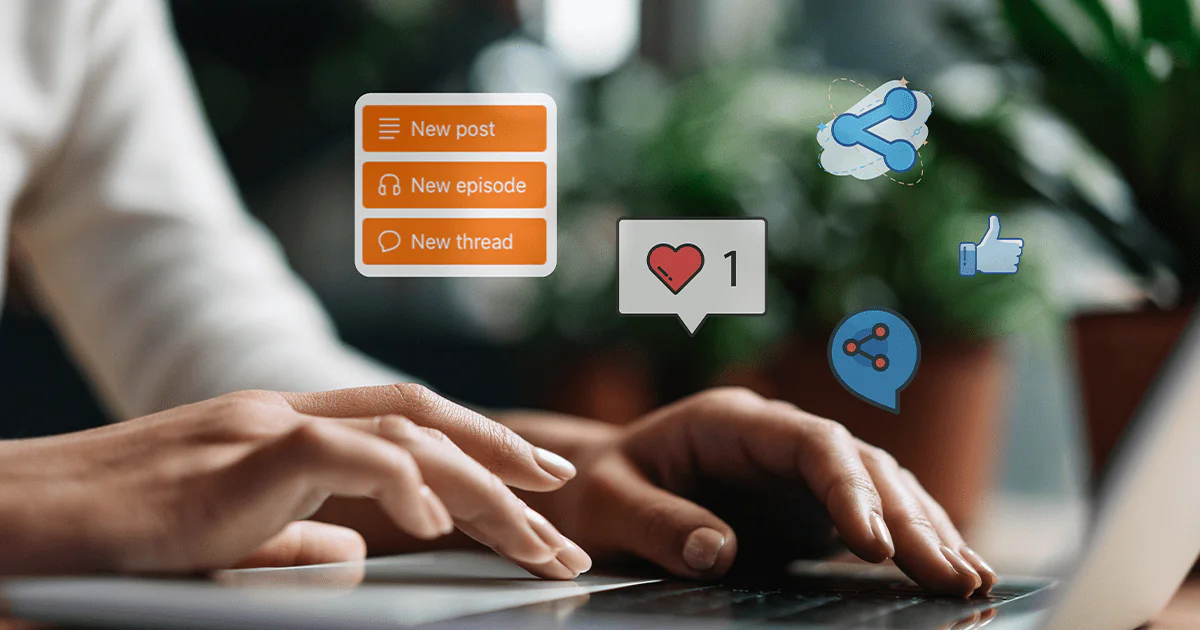 Hands typing on a laptop with social media icons and notifications
