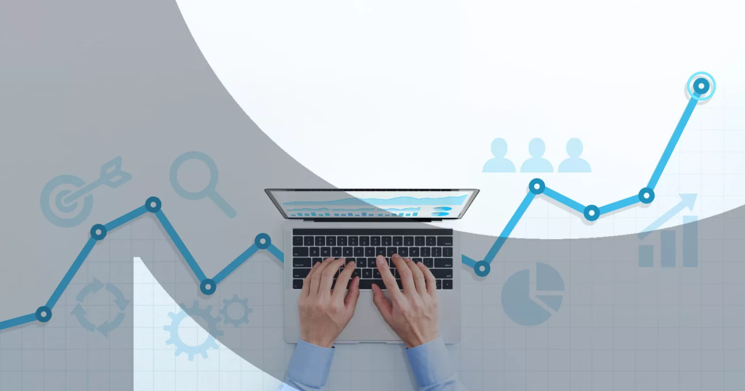 Hands typing on a laptop with a rising blue graph line overlaid