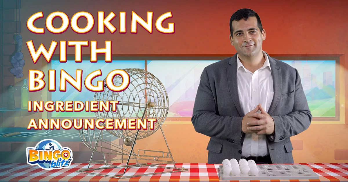 Man in suit announcing cooking bingo ingredients on a checkered table with bingo cage in a studio kitchen setting.
