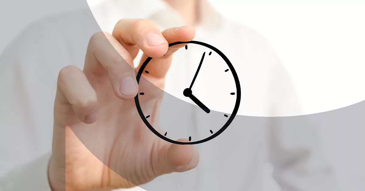 Hand holding transparent clock