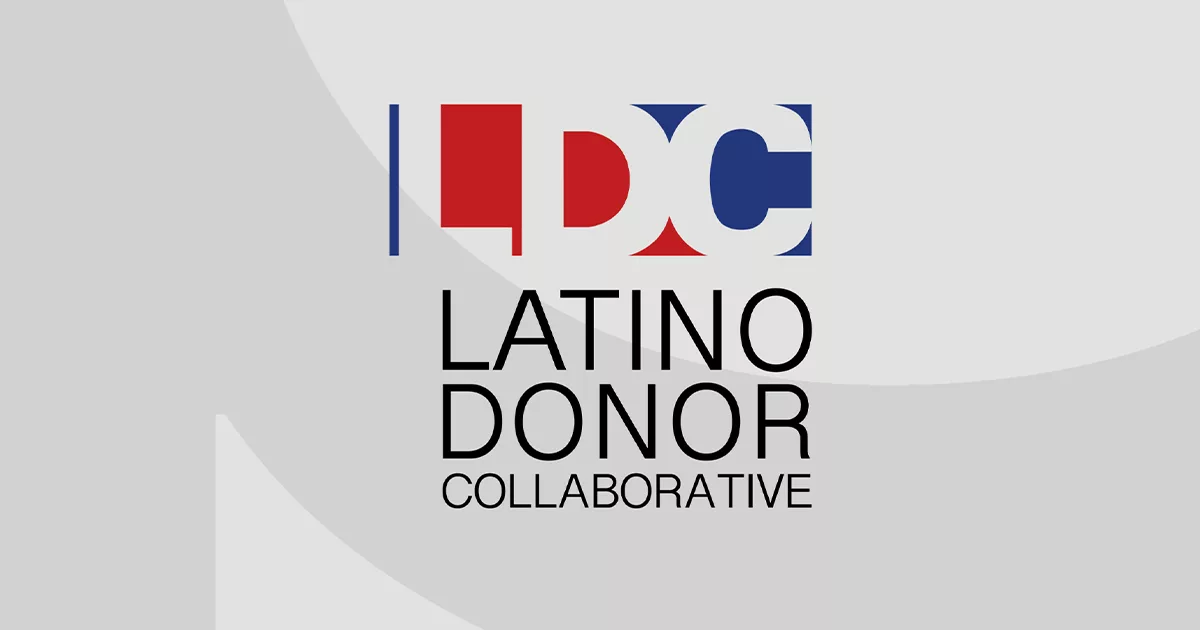 Latino Donor Collaborative logo with bold red and blue geometric design on a light gray background.