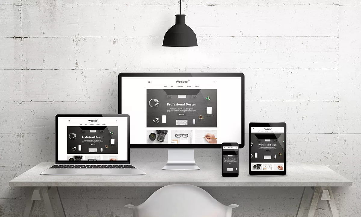 Modern workspace with responsive website on desktop