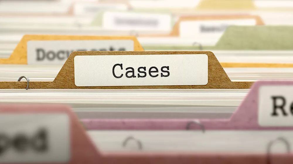 Close-up of file folders with visible tab labeled "Cases