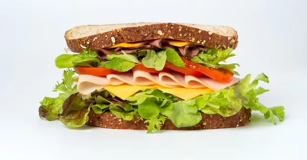 Multigrain sandwich with layers of turkey
