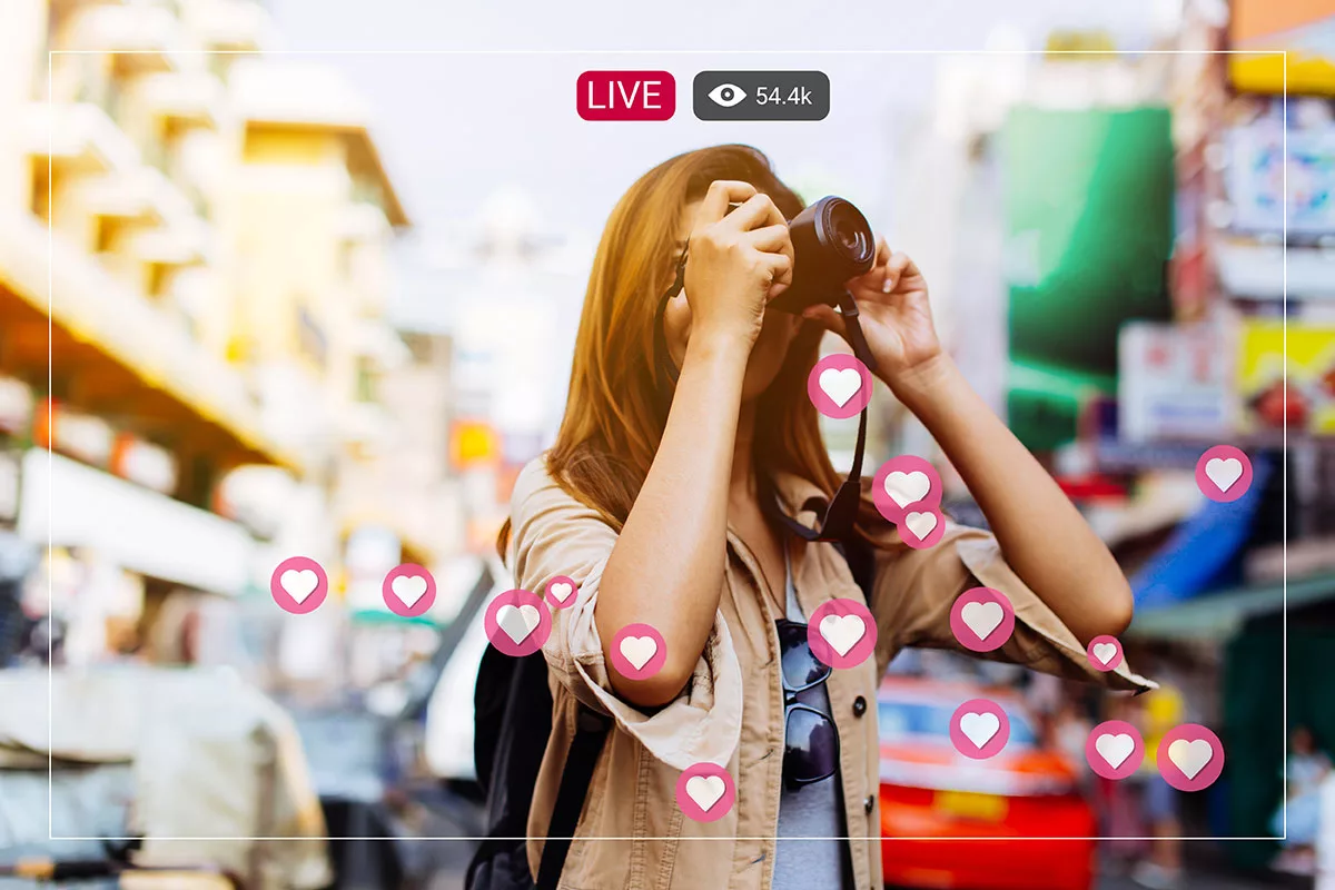 Woman photographing city scene