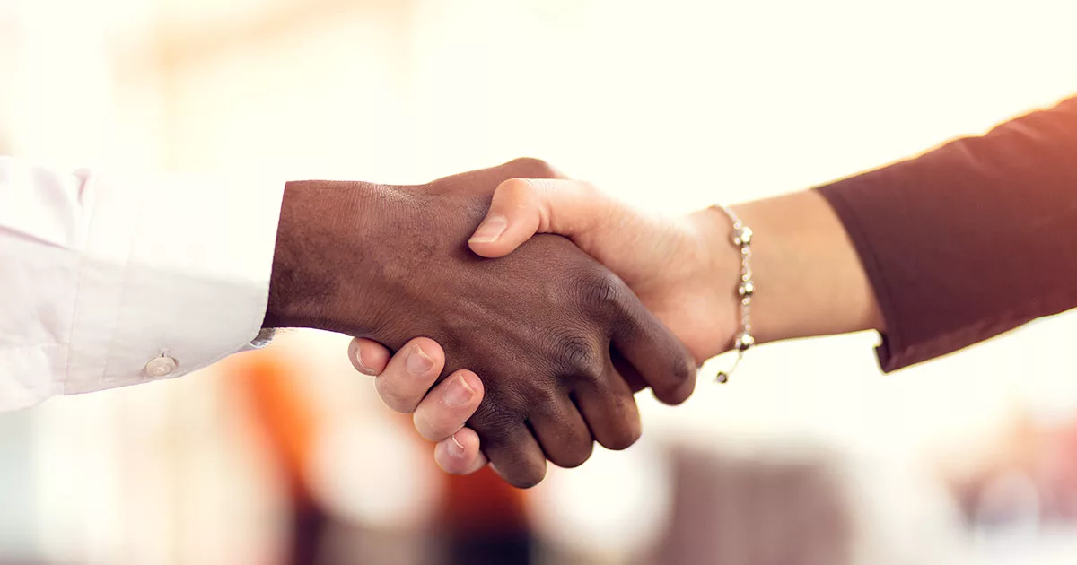 Two people shaking hands