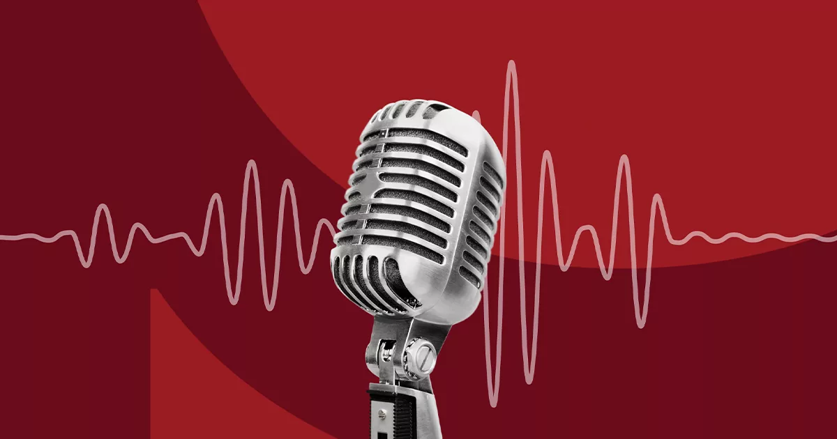 Vintage microphone with a red soundwave background